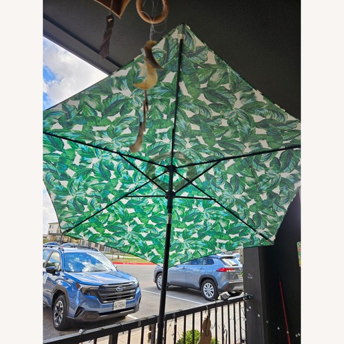 Used Patio Umbrella & Metal Stand for sale on AptDeco