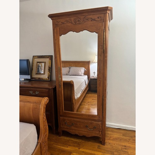 Used Ethan Allen Bonnetiere Mirrored Armoire Wardrobe for sale on AptDeco
