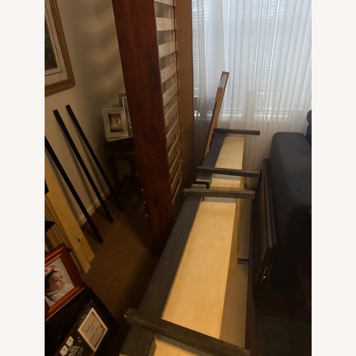 Used Raymour & Flanigan Dark Brown Wood Twin Bed for sale on AptDeco