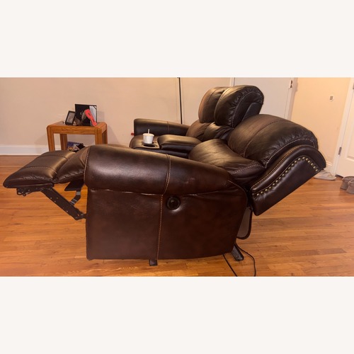Used Dark Brown Leather 2 Seater Reclining Sofa  for sale on AptDeco