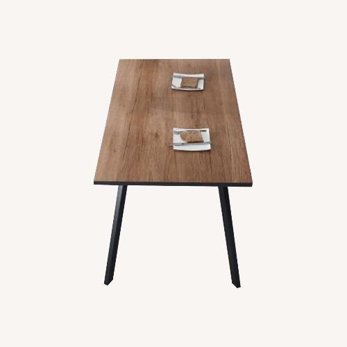 Used Wade Logan Light Brown Wood Dining Table for sale on AptDeco