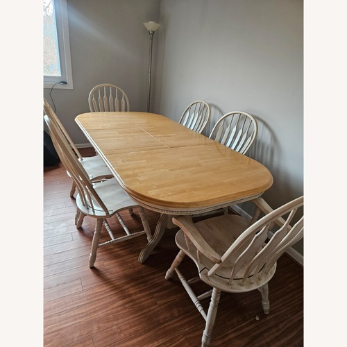 Used Extendable Wooden Dining Set with 8 Chairs  for sale on AptDeco
