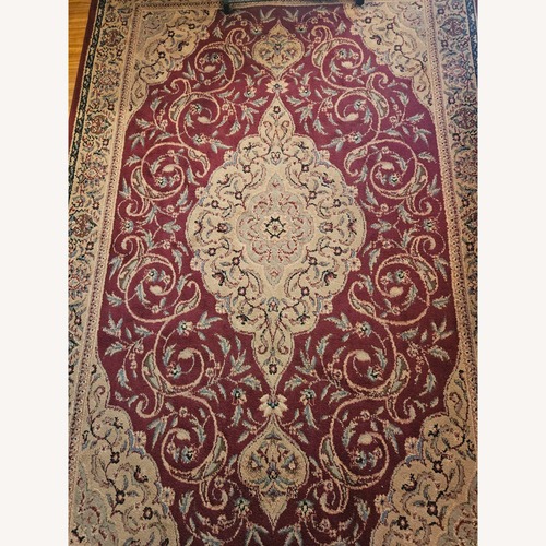 Used Wool Area Rug 63' x 93' for sale on AptDeco