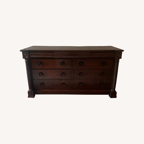 Used Ashley Furniture Cherry Brown 9-Drawer Dresser for sale on AptDeco