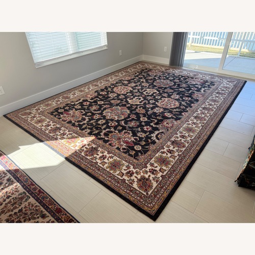 Used Black Area Rug 9.5' x 13' for sale on AptDeco