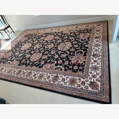 Used Black Area Rug 9.5' x 13' for sale on AptDeco