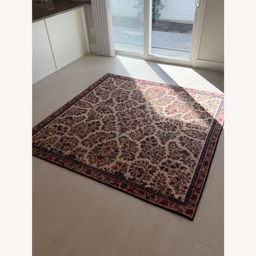 Used White Floral Area Rug 6.6' x 6.6' for sale on AptDeco