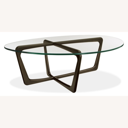 Used Room & Board Dunn Oval Glass & Wood Coffee Table for sale on AptDeco
