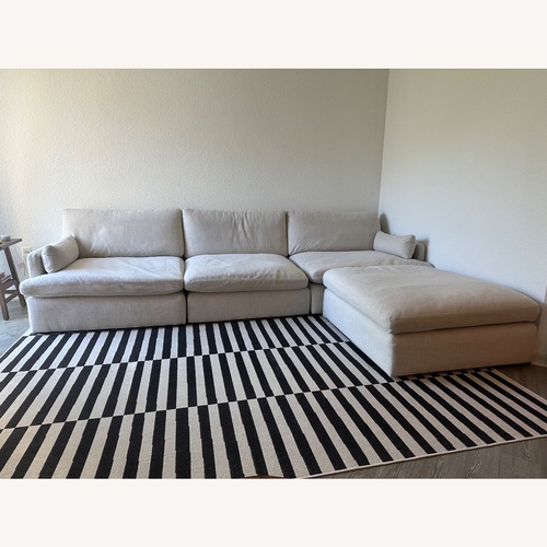 Used Ashley Furniture Tanavi Beige 3-Piece Sectional plus Ottoman for sale on AptDeco