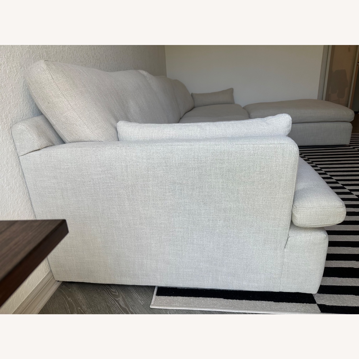 Ashley Furniture Tanavi Beige 3-Piece Sectional plus Ottoman - image-3