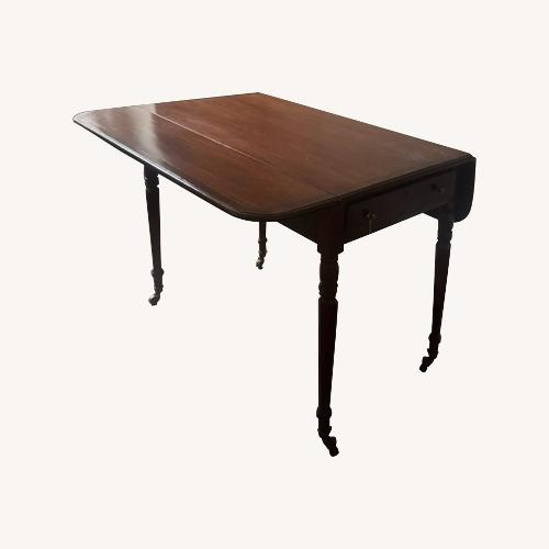 Used Vintage/Antique Dark Brown Wood Desk for sale on AptDeco