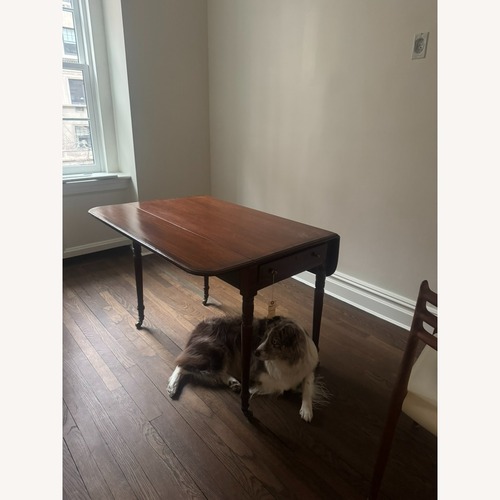 Used Vintage/Antique Dark Brown Wood Desk for sale on AptDeco