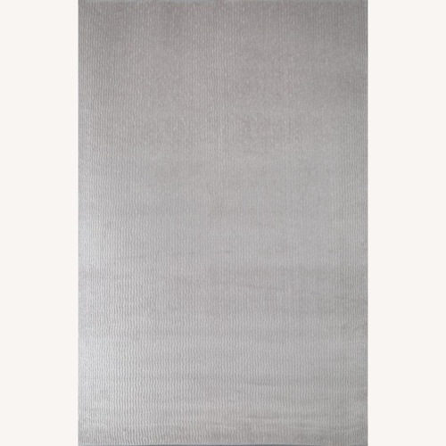 Used Light Gray Fabric Area Rug 10' x 14' for sale on AptDeco