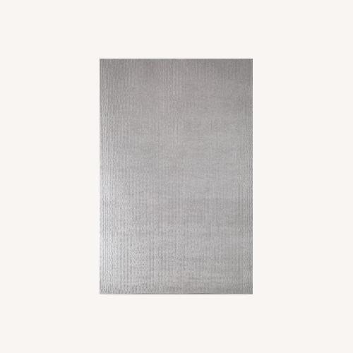 Used Light Gray Fabric Area Rug 10' x 14' for sale on AptDeco