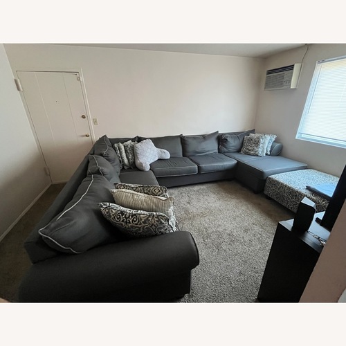 Used Bob's Discount Sectional Sofa with Full Bed for sale on AptDeco