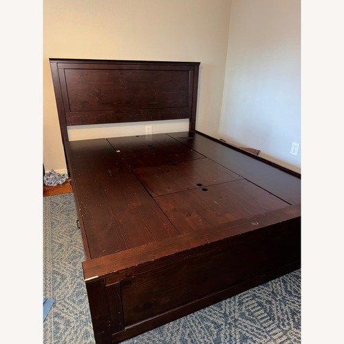 Used  Wooden Queen Bed Frame for sale on AptDeco