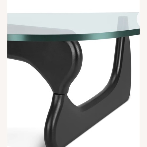 Used Herman Miller Style Black Glass Coffee Table for sale on AptDeco