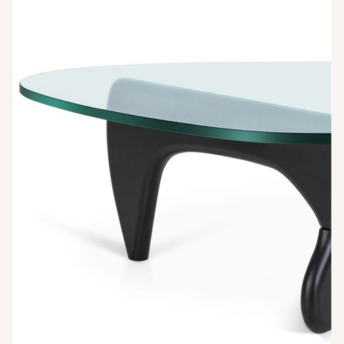 Used Herman Miller Style Black Glass Coffee Table for sale on AptDeco