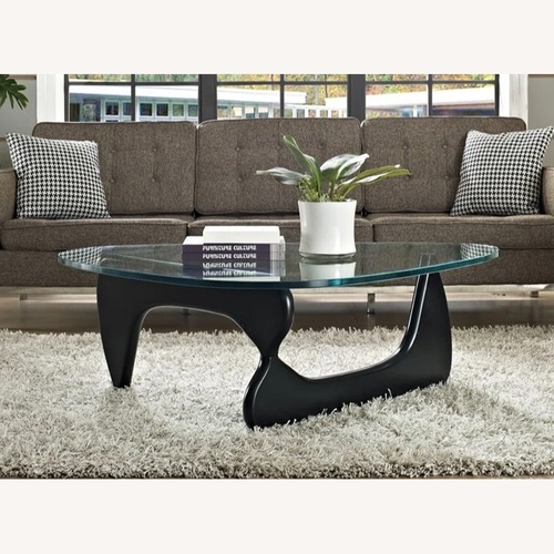 Used Herman Miller Style Black Glass Coffee Table for sale on AptDeco