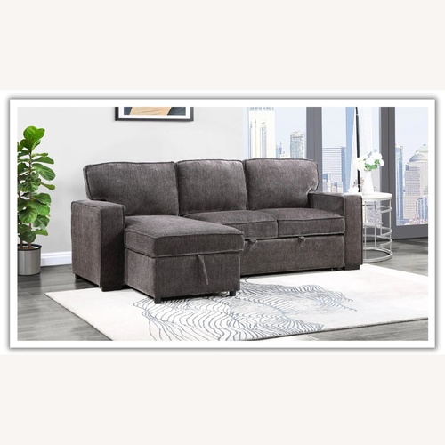 Used Jennifer Convertibles Dark Gray Chaise Lounge for sale on AptDeco