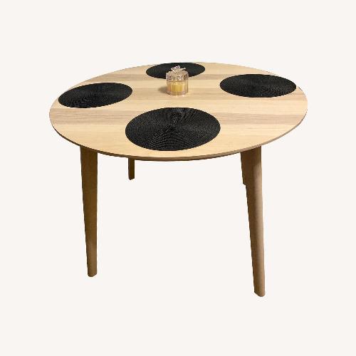 Used Lightwood Dining Table for sale on AptDeco