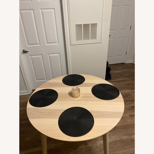 Used Lightwood Dining Table for sale on AptDeco