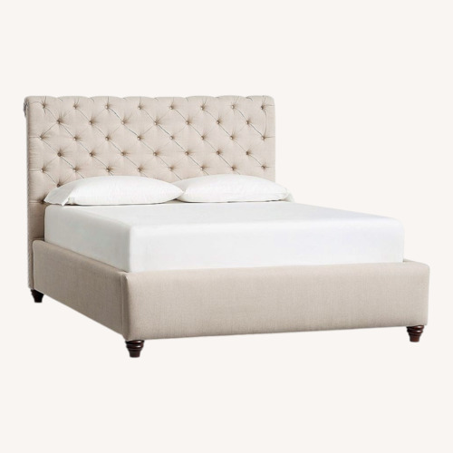Used Pottery Barn Chesterfield Natural Queen Bed for sale on AptDeco