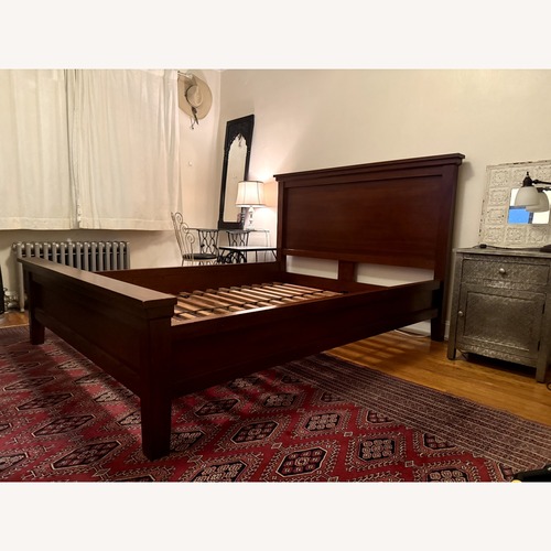 Used Pottery Barn Farmhouse Dark Brown Wood Queen Bed for sale on AptDeco