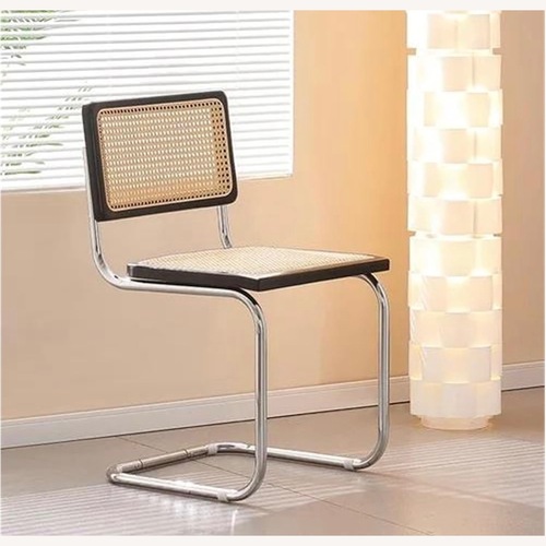 Used Vintage Wood Rattan Dining Chair for sale on AptDeco