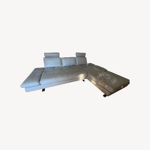 Used Natural Leather 2 Piece Sectional for sale on AptDeco