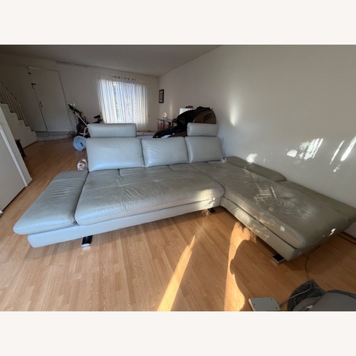 Used Natural Leather 2 Piece Sectional for sale on AptDeco