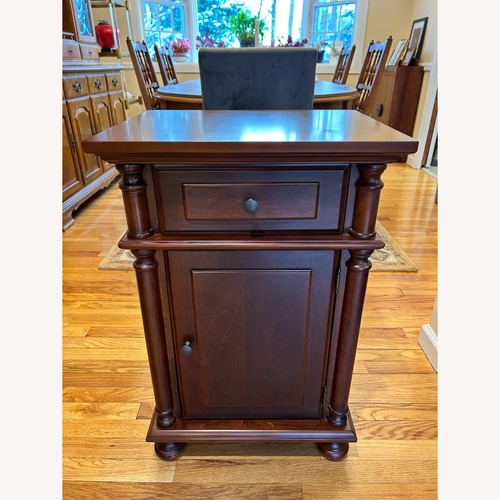 Used Dark Brown Wood Side Table / Nightstand for sale on AptDeco