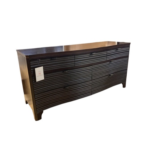 Used Brownstone 7-Drawer Wave Front Dark Wood Dresser for sale on AptDeco