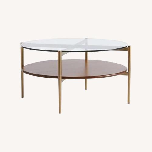 Used West Elm Mid-Century Art Display Round Coffee Table 34" for sale on AptDeco