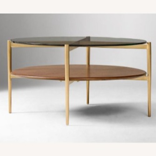 Used West Elm Mid-Century Art Display Round Coffee Table 34" for sale on AptDeco