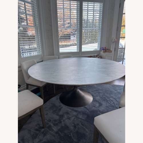 Used Restoration Hardware Aero Stone Dining Table for sale on AptDeco