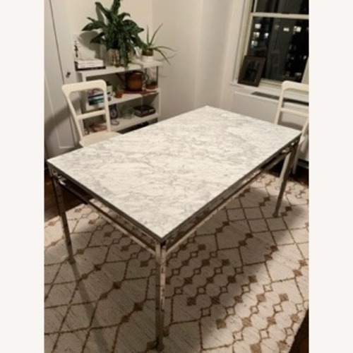 Used Pottery Barn Tanner Fixed Dining Table Nickel Marble  for sale on AptDeco