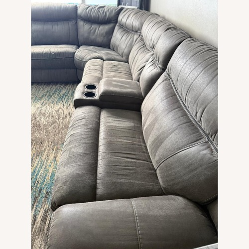 Used Rooms To Go  Dark Gray Fabric 5+ Piece Sectional for sale on AptDeco