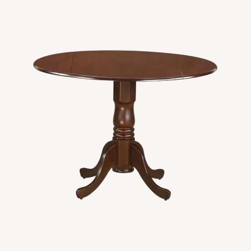 Used Amazon Dark Brown Wood -Round Dining Table for sale on AptDeco
