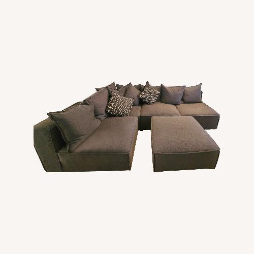 Used Raymour & Flanigan Chenille Sectional + Ottoman for sale on AptDeco