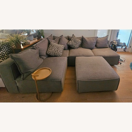 Used Raymour & Flanigan Chenille Sectional + Ottoman for sale on AptDeco