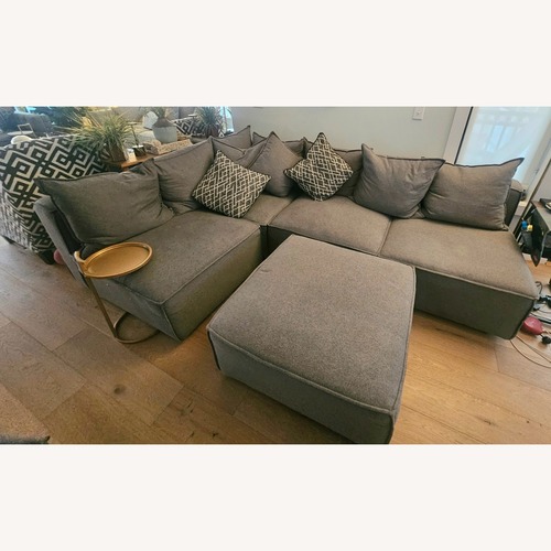 Used Raymour & Flanigan Chenille Sectional + Ottoman for sale on AptDeco