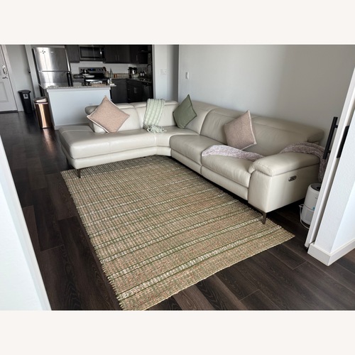 Used Living Spaces Lux Modern Leather Sectional Recliner for sale on AptDeco