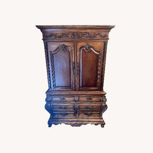 Used Vintage/Antique Dark Brown Wood Armoire for sale on AptDeco