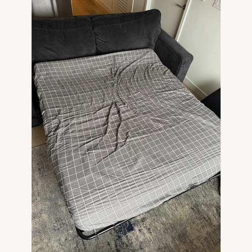 Used Ashley Pull Out sofa for sale on AptDeco