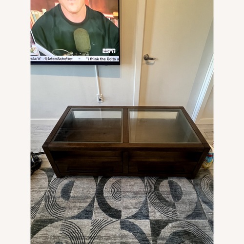 Used Living Spaces Sawyer Brown Walnut 54"Wide Rectangle Coffee Table for sale on AptDeco