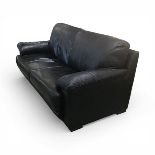 Used Low Two-Cushion Faux Leather Sofa Black for sale on AptDeco