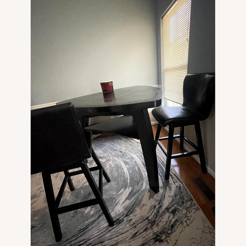 Used Unique Black Tall Wood Table with Chairs- Set for sale on AptDeco
