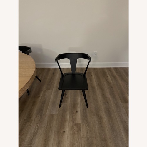 Used Pottery Barn Westen Black Wood Dining Chairs for sale on AptDeco