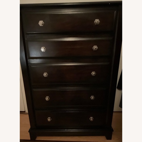 Used Ashley Ridgley Chest Dresser Dark Brown for sale on AptDeco
